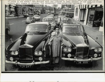 1975 Press Photo Mrs. Ebright poses with her Rolls Royce collection - hpw05314
