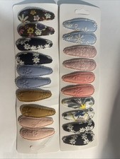 10 pairs of hair clips in assorted colors