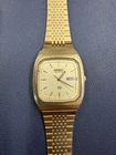 Vintage Seiko SQ Quartz Gold Tone Watch 8123 5000 Date Window