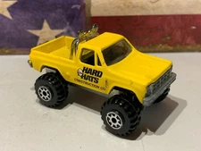 ROAD CHAMPS GMC HIGH ROLLER, YELLOW,HARD HATS,1:64  LOOSE