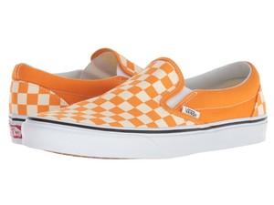 vans checkerboard slip on yellow