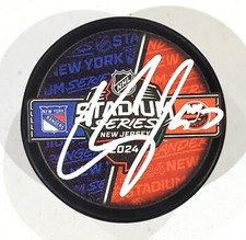 CASEY CIZIKAS SIGNED NEW YORK ISLANDERS STADIUM SERIES PUCK NHL HOCKEY W/LOA