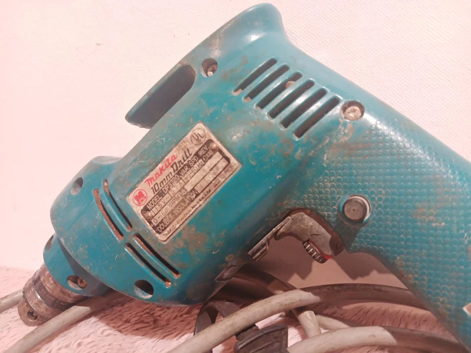 Taladro de colección Makita DP3720 10 mm con cable azul con llave mandril velocidad variable probado Foto 2 de 4