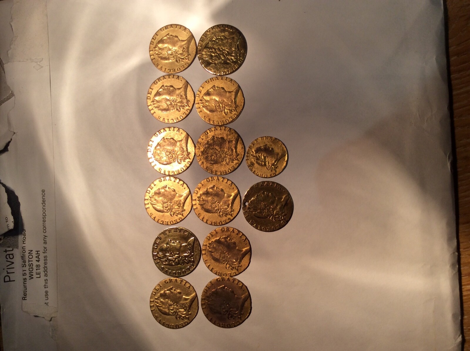 111 brass tokens, 1nr (spade half guinea), 13nr (spade guineas