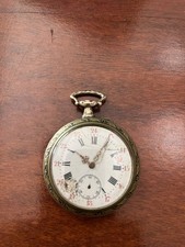 Montre à gousset ancienne au dos gravure de guerriers et