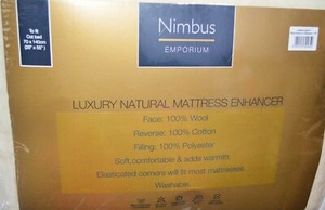 cot bed mattress enhancer