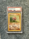 Hitmonchan 7/102 Base Set Holo Rare Unlimited Pokemon 1999 Near Mint PSA 7