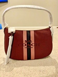 coach horse and carriage jacquard sutton crossbody
