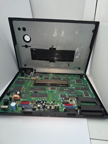 NEO GEO AES CONSOLE SYSTEM FOR PARTS OR REPAIR  POWERS ON NO CLEAR PICTURE #M24