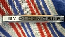 1974 1975 NOS Oldsmobile Rear Compartment Trunk Lid “By Oldsmobile” Name Plate