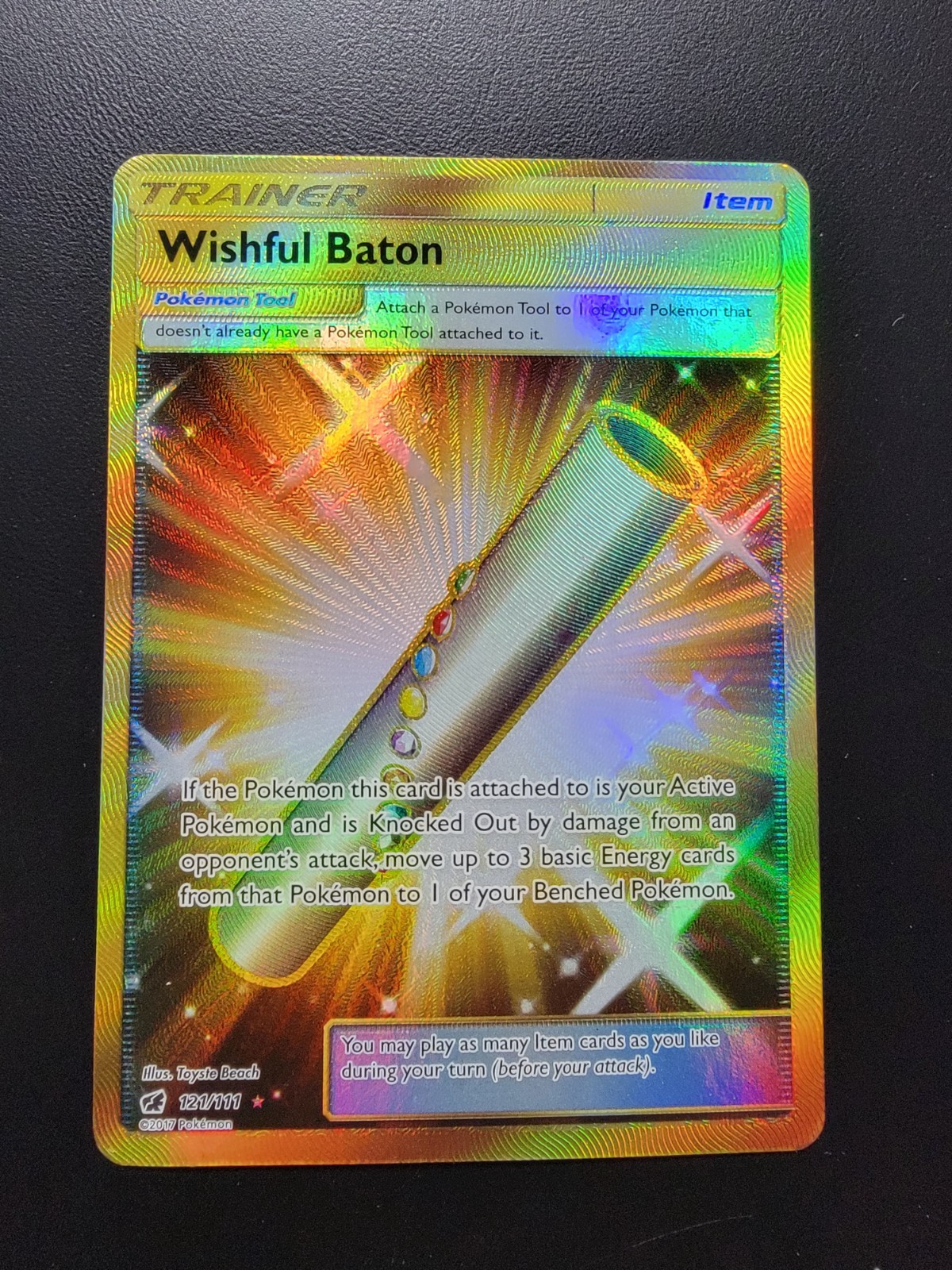 Wishful Baton (Secret) 121/111 Sm-Crimson Invasion Holo pokemon