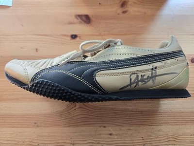 Usain Bolt, Puma-Laufschuh, original handsigniert, 8 x Olympiasieger, 11 x WM
