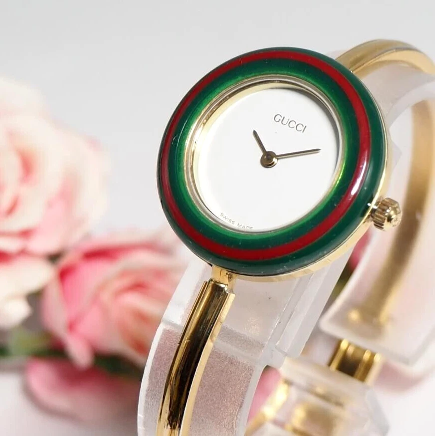 Montre femme Gucci lunette à changement dorée quartz blanc suisse vintage authentique 11/12,2