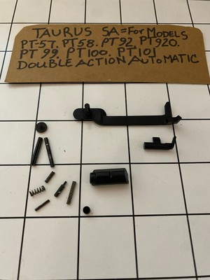 TAURUS SA PT100 Magazine release ,Trigger bar .hammer catch & more