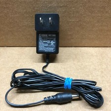 CANON MODEL NUMBER AC-380 AC ADAPTER 120-240VAC 50-60Hz .2A TO 6.3VDC .4A TESTED
