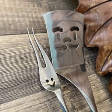 four star spatula with face and carving fork ...