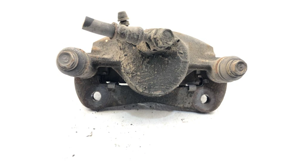 Pinza de freno delantera izquierda Toyota Camry Driver 1986 con soporte de montaje 4775032041 Foto 4 de 4