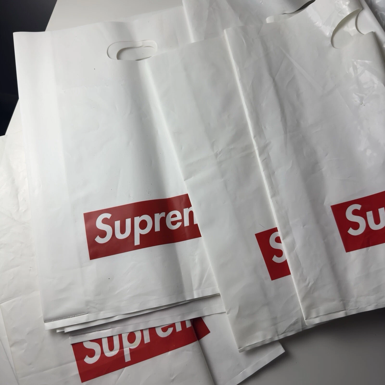 Sac shopping original Supreme en plastique blanc logo boîte rouge 13