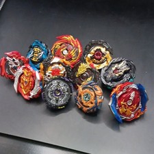 Beyblade Burst Lot of 11 Spinning Tops Plastic/Metal Multicolor