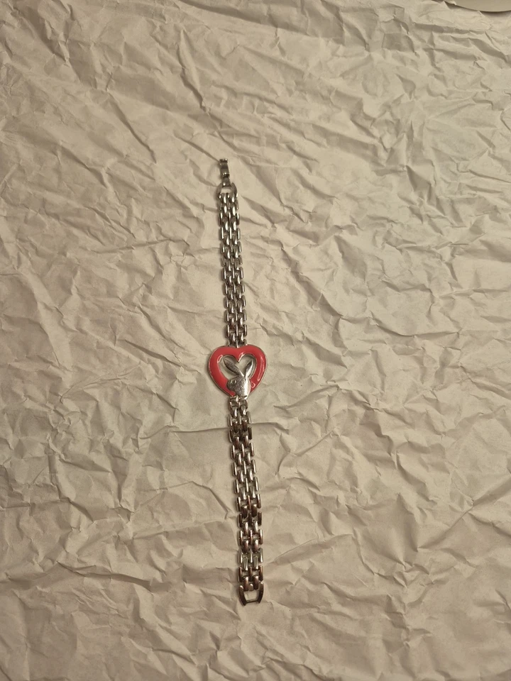 PULSERA PLAYBOY de principios del 2000 tono plata con corazón rosa Foto 2 de 4