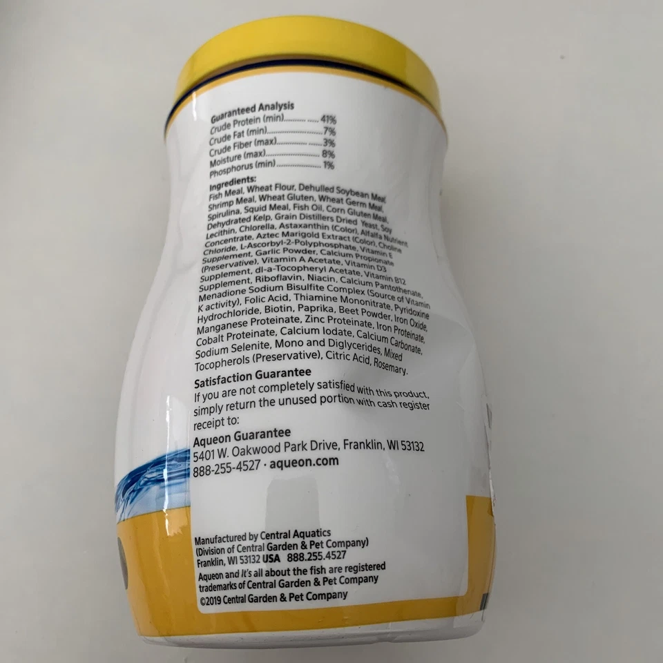 Alimento para peces Aqueon Tropical Flakes para acuario - lata abollada de 7,12 oz caduca junio 2025 Foto 2 de 4