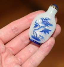 → View on eBay: antique Chinese carved sapphire blue peking glass snuff bottle, Qing Dynasty 18C antique Chinese carved sapphire blue peking glass snuff bottle, Qing Dynasty 18C