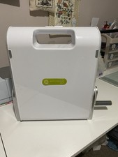 Accuquilt go Big Cutting Machine With Three Block on Board Cutting Dies.