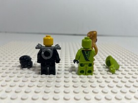 LEGO Ninjago: Cole ZX + Lasha Minifigures from 9447 Lasha's Bite Cycle