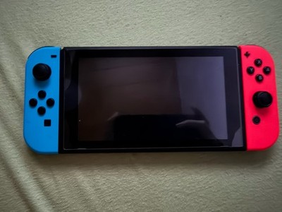 Nintendo Switch OLED + Lenkräder + Controller  +mehr