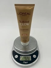 One L'OREAL Sublime Glow Daily Moisturizer Medium Skin Tone 8 fl. oz.