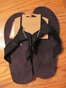 black cloth flip flops
