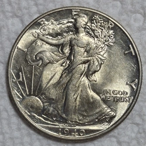 1940 P Walking Liberty Silver 1/2 Dollar. Estimated Almost Uncirculated 58. M101