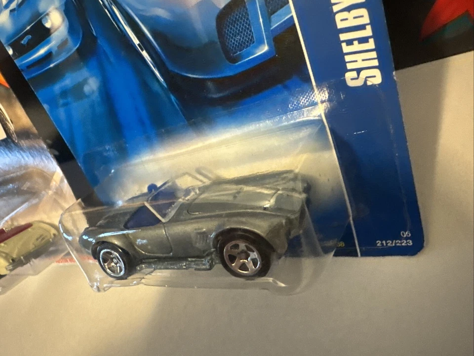 Shelby Cobra 427 S/C Silver & Matchbox 2019 63 Austin Healey Hot Wheels 2007 Foto 3 de 4