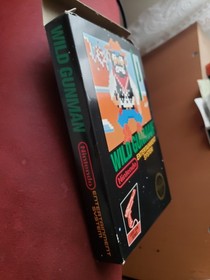 Pistola Wild Gunman Nintendo NES CIB Completa Hangtab 5 Tornillos Caja Negra NTSC Atari