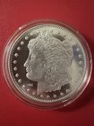 1 Troy Oz .999  Fine Silver Morgan Style Round – Highland Mint (HM)