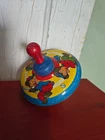Vintage 1930's Ohio Art Co. Tin Lithography USA Pump Activated Spinning Top