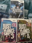 Three Wii Games Michael Jackson: The Experience, and Just Dance 3 & 4