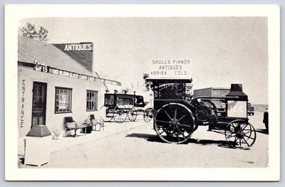 Vintage Colorado Postcard ARRIBA Shull Pianos Antiques US Highway 24