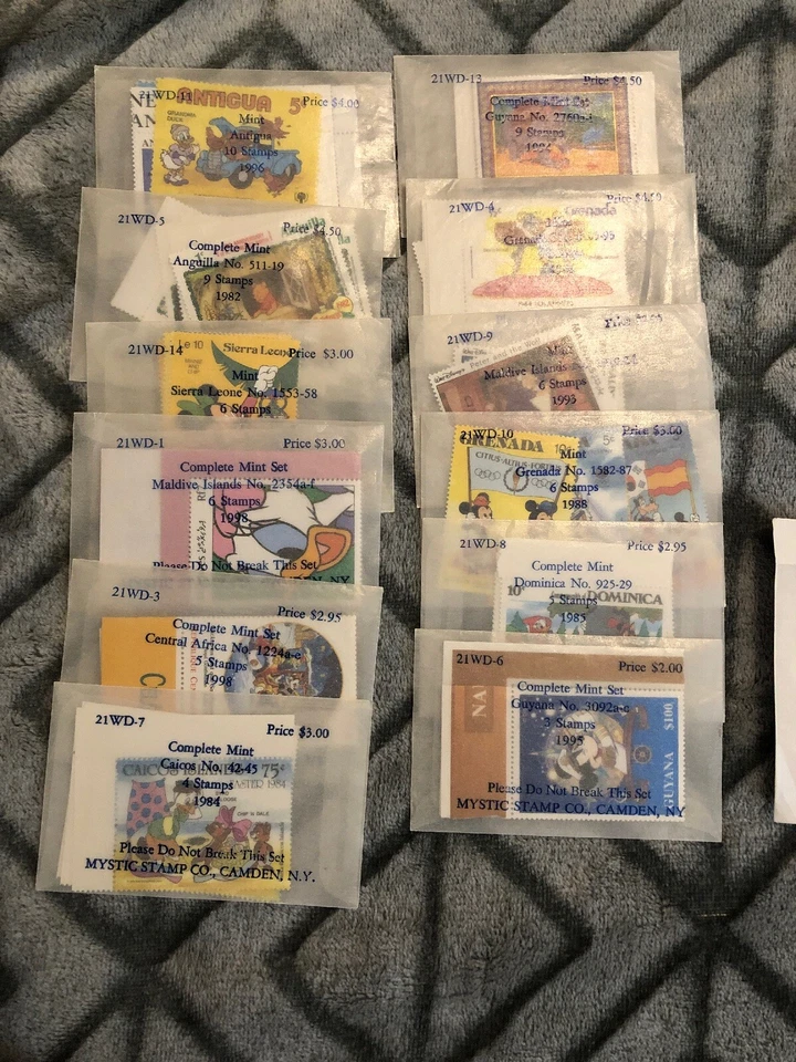 LOTE DE 95 HOJAS DE ESTAMPILLAS CLÁSICAS GRANADA DISNEY PETER PAN Foto 2 de 4