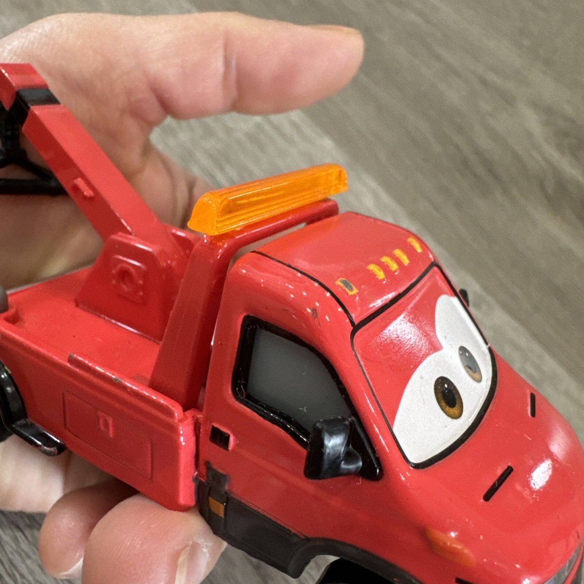 Disney / Pixar Cars Mainline Towin' Eoin Diecast Deluxe Red Car