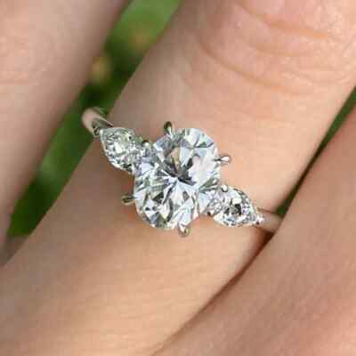 2.10 CTW Oval Cut Moissanite Three Stone Engagement Ring 14K White Gold Plated