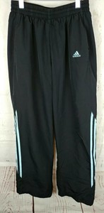 black adidas pants with blue stripes