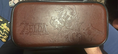 Nintendo Switch Lite Blue Handheld System w/ Zelda Zip Travel Case (HDH-001)