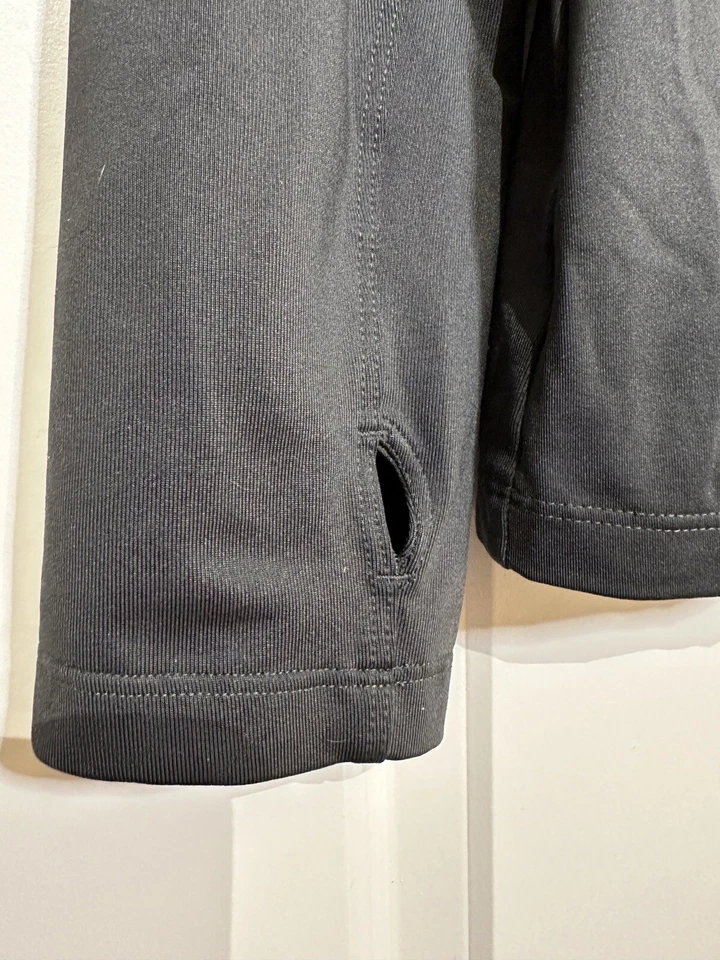 Pullover deportivo Reebok para mujer con cremallera en cuarto negro talla grande Foto 3 de 4