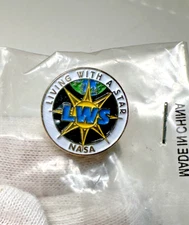 VINTAGE NASA LIVING WITH A STAR PIN UNOPENED E519