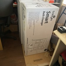 Baby Smart Changer With Bath Unit With Clever And Convenient Storage.