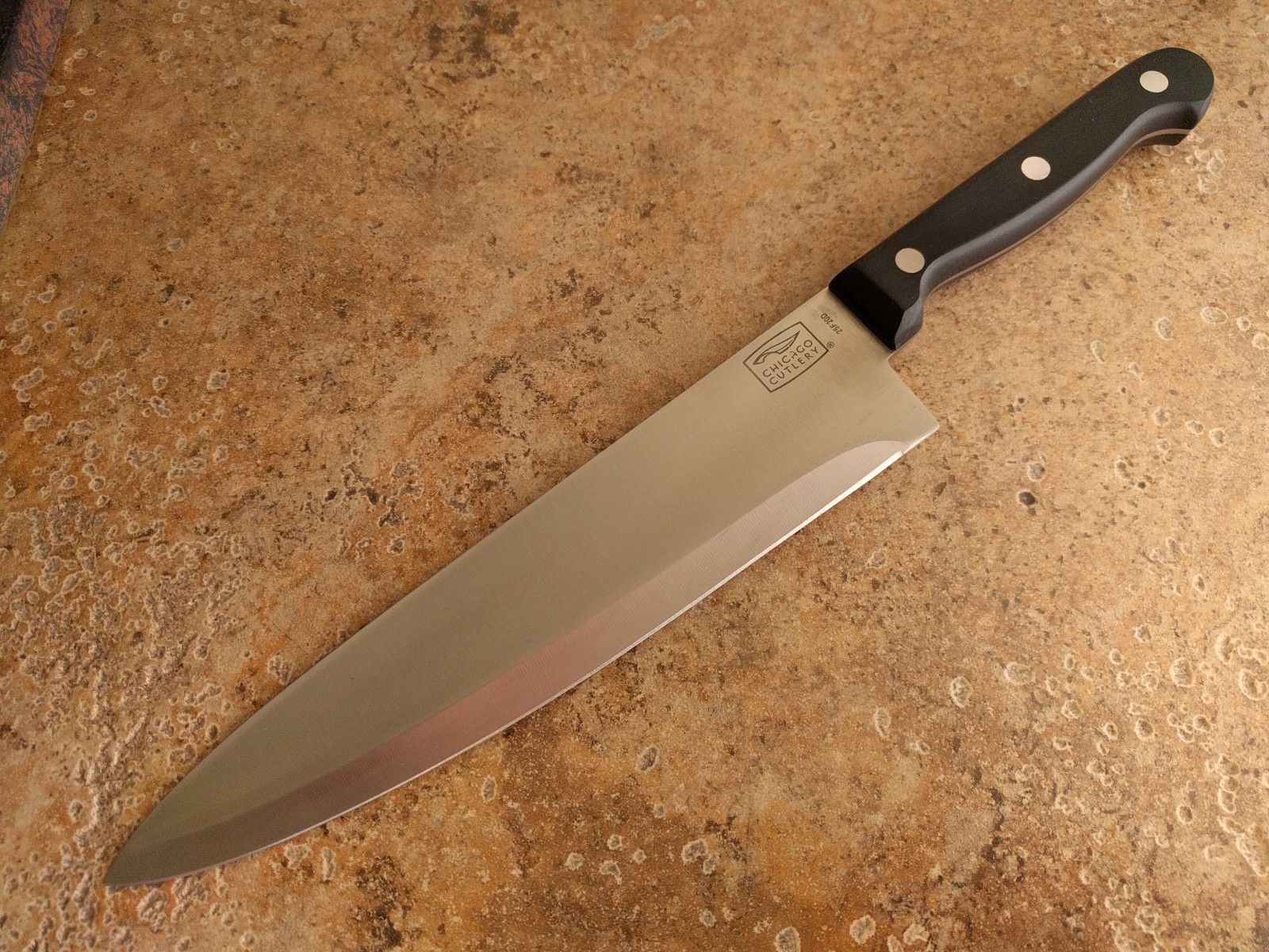 Chicago Cutlery Chef’s Knife 25F20D 8” Blade Black Handle 3 Rivet