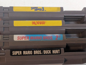 Lot of 4 Nintendo NES Mario Games, Super M 2 & 3, Dr. Mario, and M Bros Duck H.
