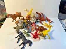 Assorted lot playset plastic figures Cowboys, Indians, plus.  Well played with.