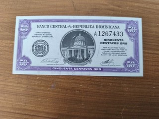 Dominicana 50 centavos oro risque déchirure pliure etc..